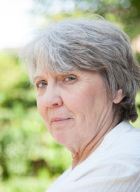 Close-up of young woman looking away