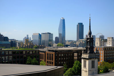 London skyline viewed from the top of one new change. an afternoon shot with clear blue sky.