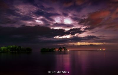 Scenic view of sea against dramatic sky