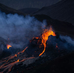 Smoke emitting from volcanic mountain