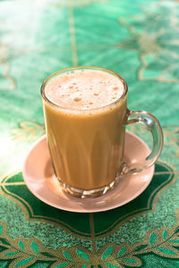 High angle view of coffee on table