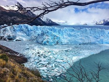 Scenic view of snow covered mountains