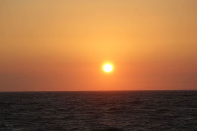 Dramatic sky over sea during sunset