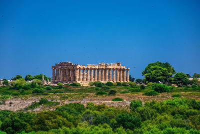  temple of hera at selinunte, sicily against clear blue sky