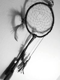 Close-up of electric lamp hanging on floor