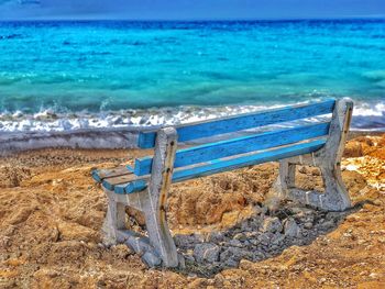 Aerial view of empty chairs on beach