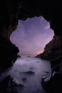 Pacific waves crash through a sea cave at leo carillo state park