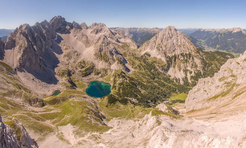 Panoramic view of rocks and mountains against sky