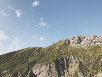 Low angle view of mountains against sky