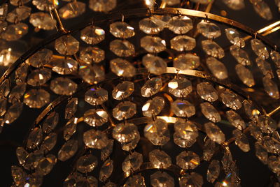 Low angle view of illuminated lighting equipment