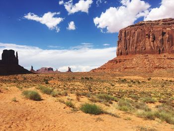 Rock formations on landscape against sky