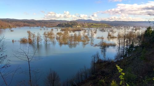Scenic view of lake against sky