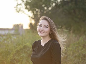 Close-up portrait of young woman outdoors