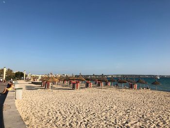 Panoramic view of beach against clear sky