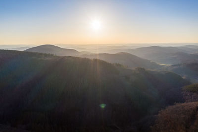 Scenic view of mountains against sky during sunset