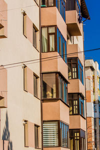 New apartment building with balcony and reflection window