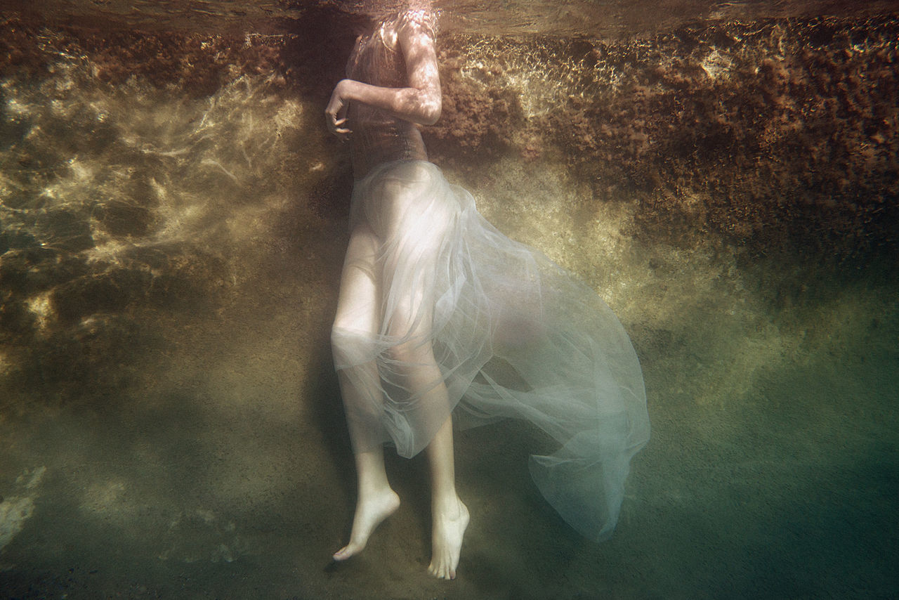 underwater, water, one person, standing, real people, swimming pool, women, full length, indoors, one young woman only, swimming, day, one woman only, young adult, undersea, adult, people