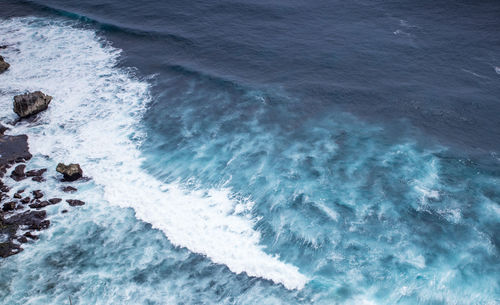 High angle view of waves in sea