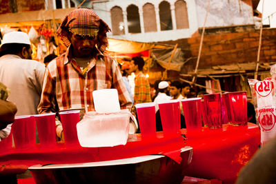 Vendor selling soft drinks in market