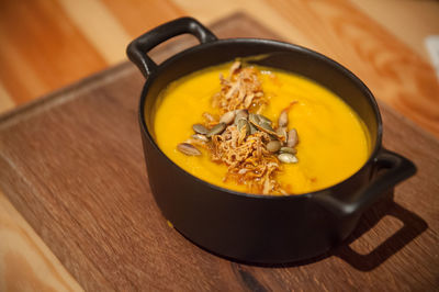 High angle view of soup in glass on table