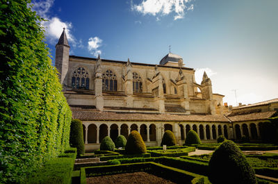 View of historical building in garden