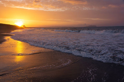 Scenic view of sea against sky during sunset