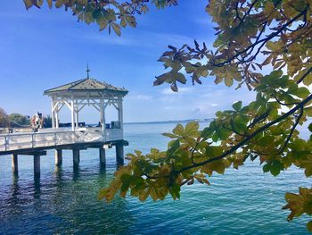 Scenic view of sea against blue sky