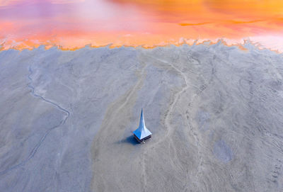 High angle view of umbrella on shore