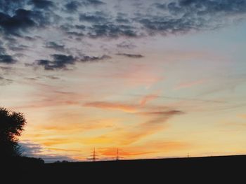 Low angle view of dramatic sky during sunset