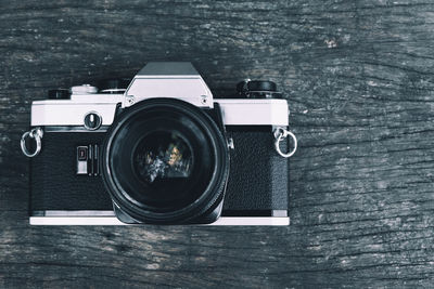 Close-up of camera on table