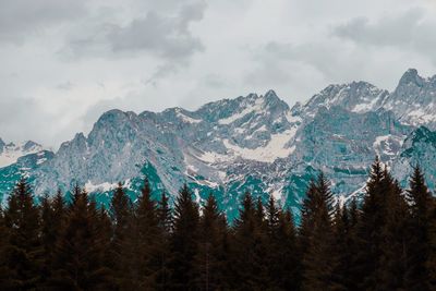 Scenic view of snowcapped mountains against sky