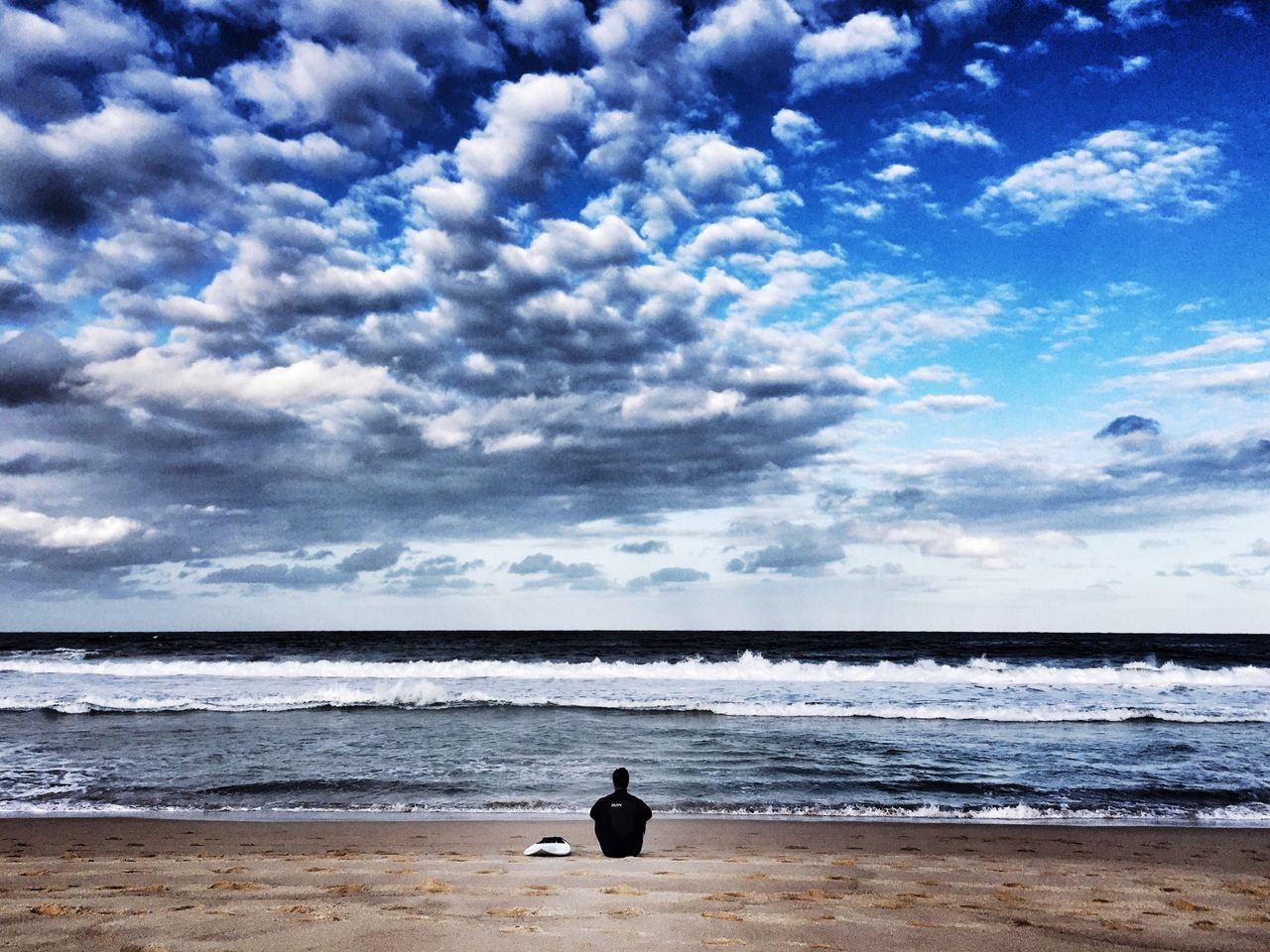 sea, beach, horizon over water, sky, shore, water, tranquility, tranquil scene, cloud - sky, scenics, beauty in nature, sand, rear view, leisure activity, nature, full length, cloud, lifestyles