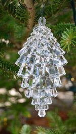 Close-up of christmas decorations hanging on tree