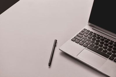 High angle view of laptop on table