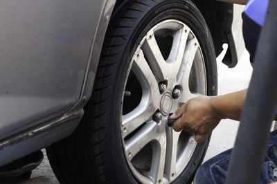 Close-up of a hand holding car