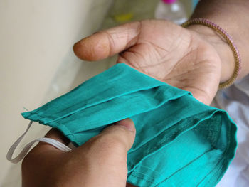 Close-up of woman holding hands