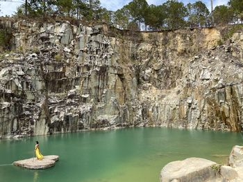 Scenic view of rock formation in water