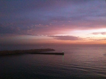 Scenic view of sunset over calm sea