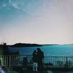 Rear view of woman looking at sea
