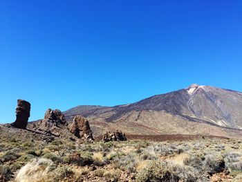 View of mountain against blue sky