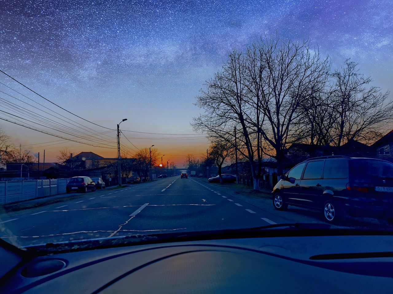 CARS ON ROAD SEEN THROUGH WINDSHIELD