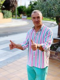 Portrait of man standing outdoors