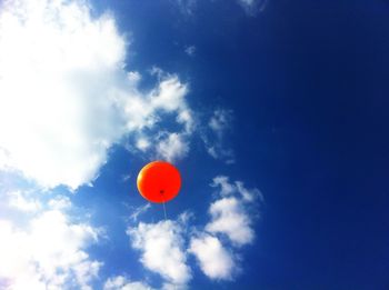 Low angle view of balloons against clear sky