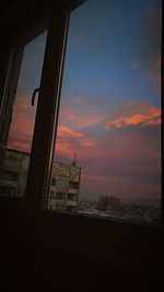 Cityscape against sky during sunset