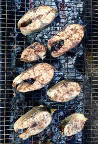 Close-up of meat on barbecue grill