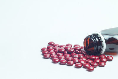 Close-up of bottles against white background