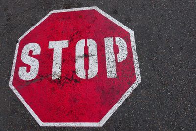 High angle view of stop sign on road