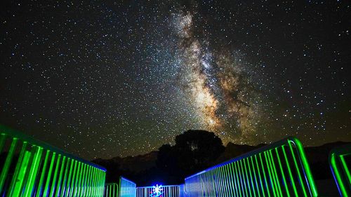 Low angle view of stars in sky at night