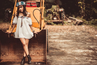 Full length of woman standing outdoors