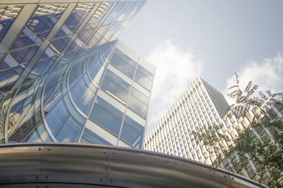 Low angle view of modern buildings against sky